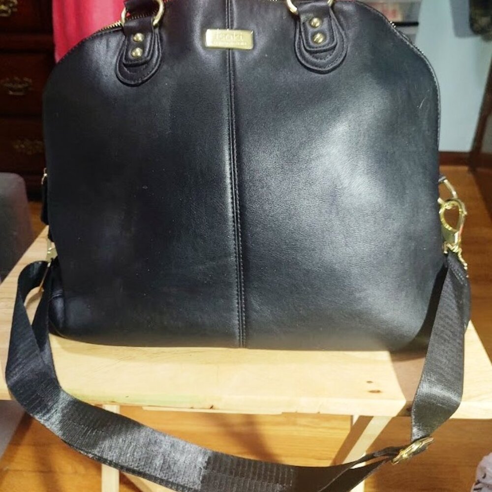 Isoki diaper bag with 3 zippers.